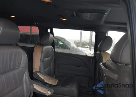 2010 Honda Odyssey Touring z USA, uszkodzony, nr VIN 5FNRL3H97AB039089